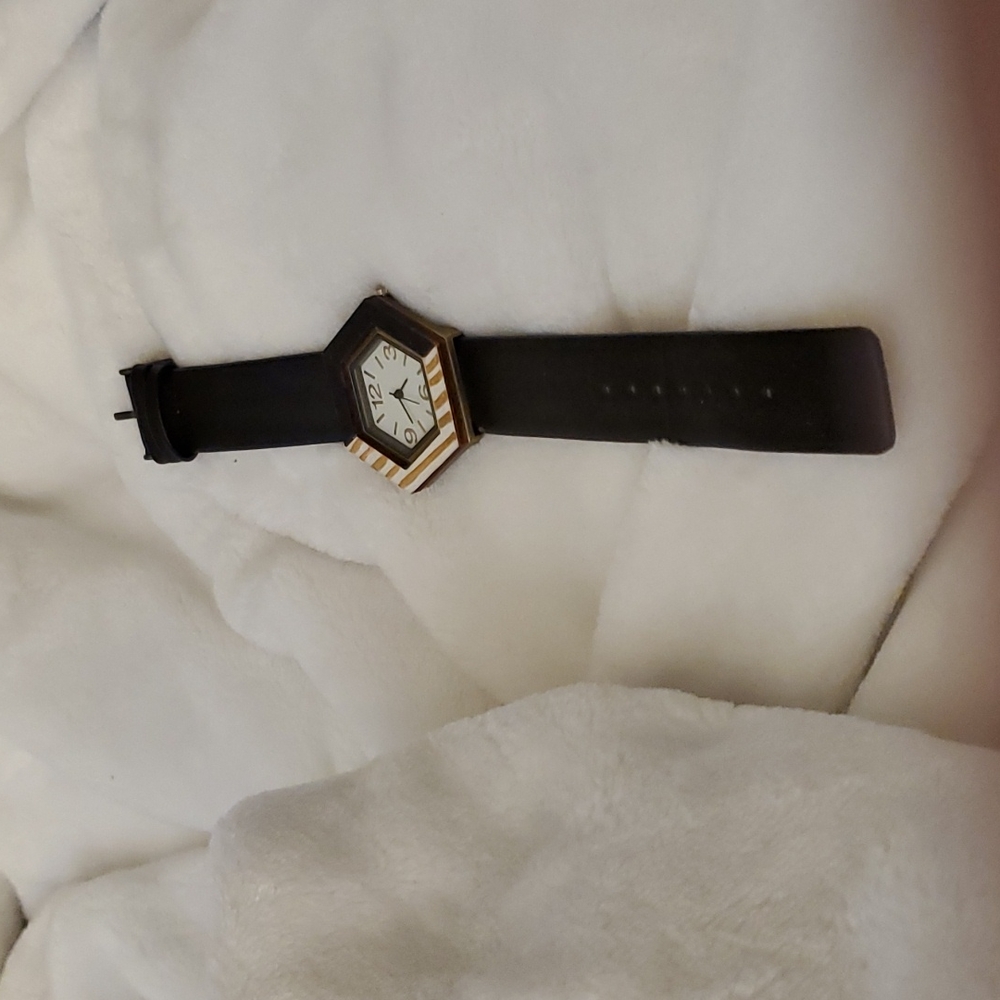 Graver watch with a wood frame.